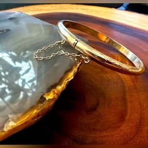 Sterling hinged cuff. 1/2 lightly etched and 1/2 smooth.